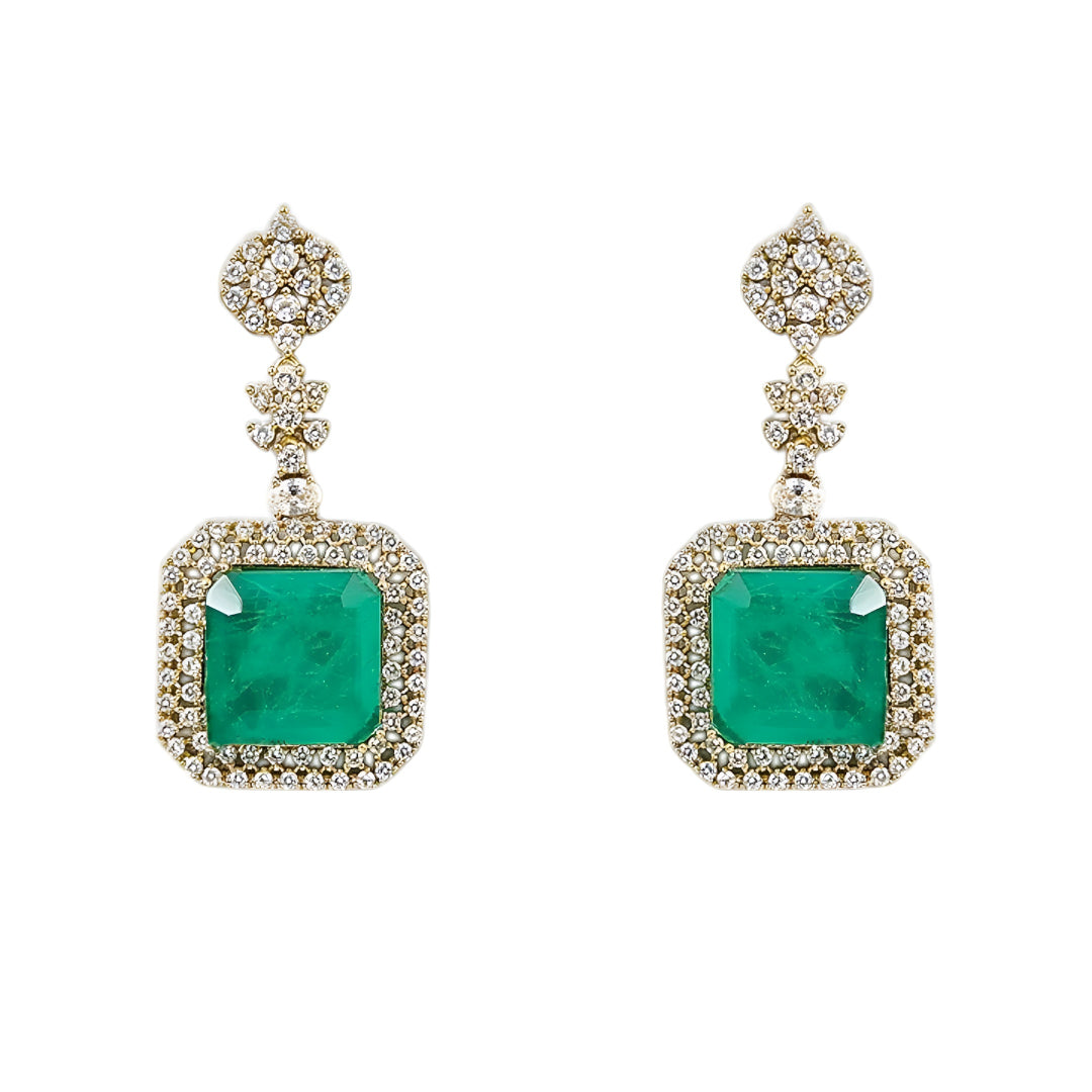 Elegant emerald green crystal pendant necklace set with sparkling zircon-studded chain and matching drop earrings in a gold-tone finish.