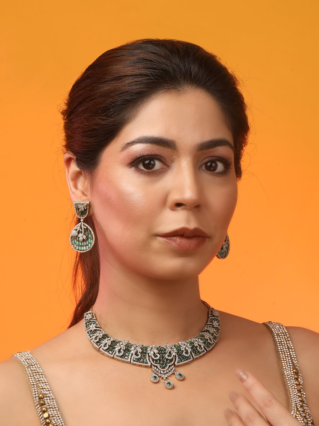 Emerald and diamond statement necklace set with matching drop earrings in gold finish
