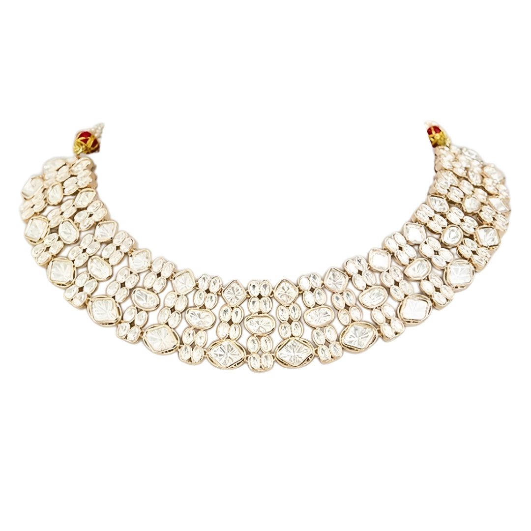 Gold-tone Kundan choker necklace set with matching earrings featuring white uncut-style stones, ideal for bridal, wedding, and festive wear.