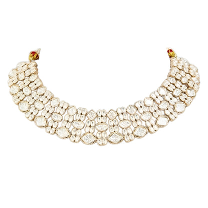 Gold-tone Kundan choker necklace set with matching earrings featuring white uncut-style stones, ideal for bridal, wedding, and festive wear.