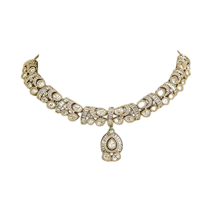 Gold-plated Kundan choker necklace set with matching drop earrings featuring teardrop stones and bridal-inspired traditional design.