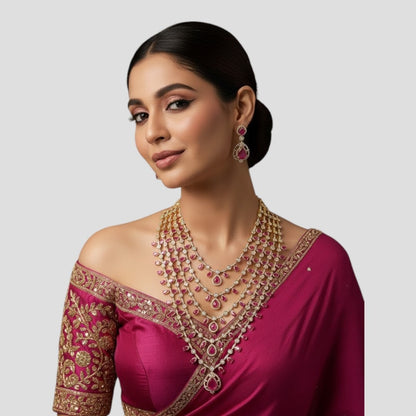 "Multi-layered gold-plated Kundan necklace set with pastel pink and green stones and matching earrings"