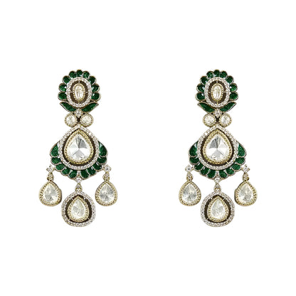 Green Kundan Polki bridal necklace set with matching earrings featuring white stones and emerald green accents in antique gold finish.