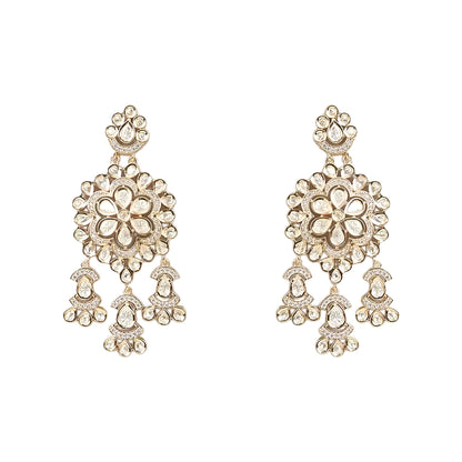 Gold-tone Kundan floral necklace set featuring a statement pendant with dangling accents and matching drop earrings on a white background.