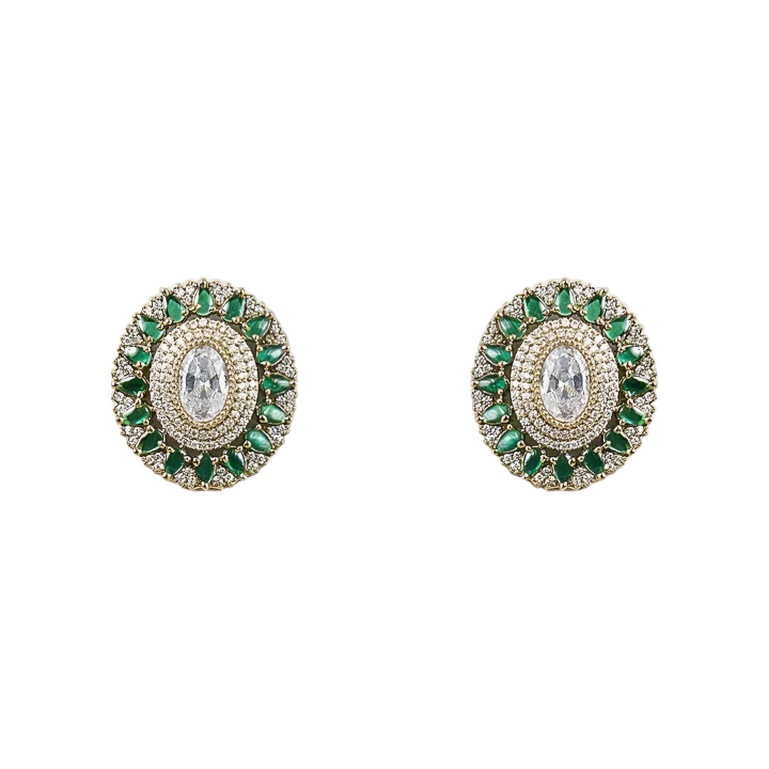Elegant diamond and emerald choker necklace set with matching stud earrings featuring intricate floral motifs, sparkling white stones, green gemstone accents, and a luxurious gold-tone finish.