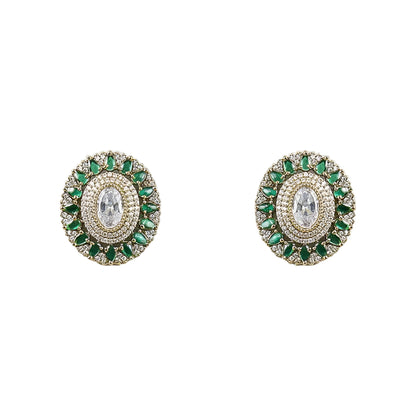 Elegant diamond and emerald choker necklace set with matching stud earrings featuring intricate floral motifs, sparkling white stones, green gemstone accents, and a luxurious gold-tone finish.