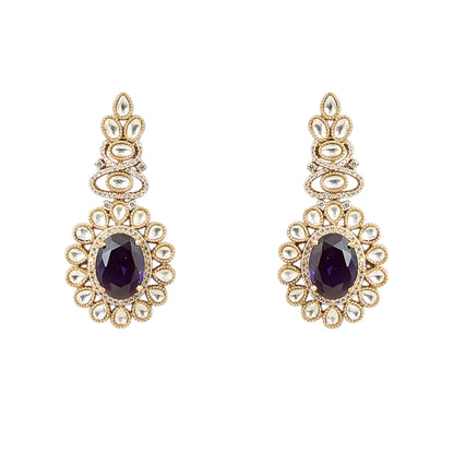 Gold-tone Kundan-inspired necklace and earrings set featuring white stones and deep purple oval gemstone accents in an elegant traditional design.