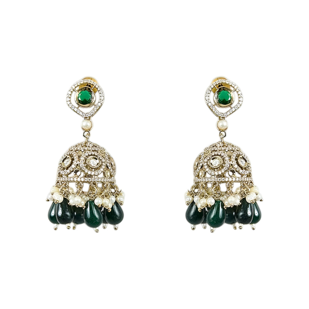 Traditional green Kundan choker necklace set with Polki stones, pearl detailing, green bead drops, and matching jhumka earrings for bridal and wedding wear.