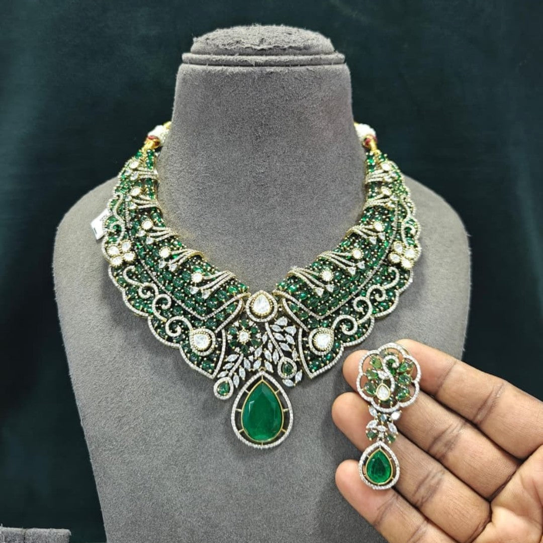 Gold plated emerald green Victorian bridal choker necklace set with American diamond scrollwork, green pear drop pendant and matching earrings