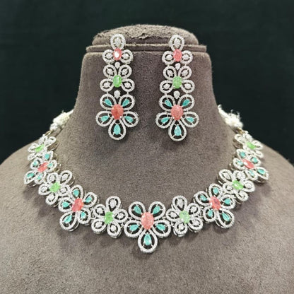 Silver-tone American diamond floral choker necklace set with coral-pink, light-green and mint stones and matching long drop earrings