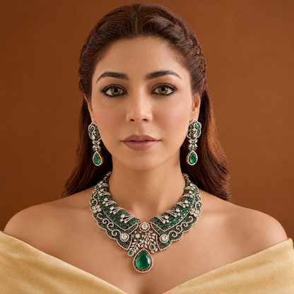 Gold plated emerald green Victorian bridal choker necklace set with American diamond scrollwork, green pear drop pendant and matching earrings