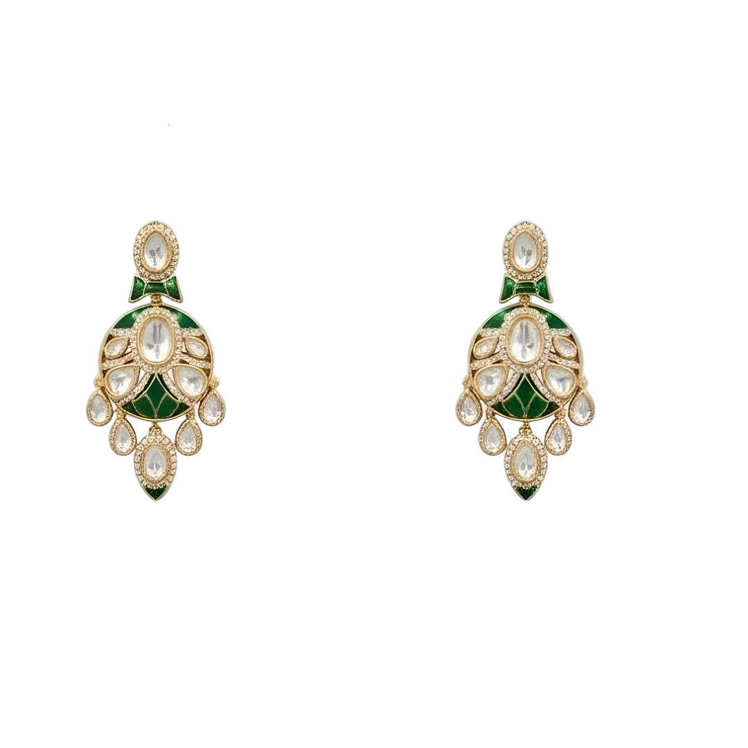 Gold-tone green meenakari kundan necklace set with round centre pendant, leaf-shaped drops and matching drop earrings on a grey display bust