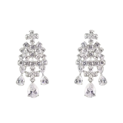 "Silver-plated floral chandelier earrings with cubic zirconia stones and pear-shaped crystal drops, product shot on grey background"