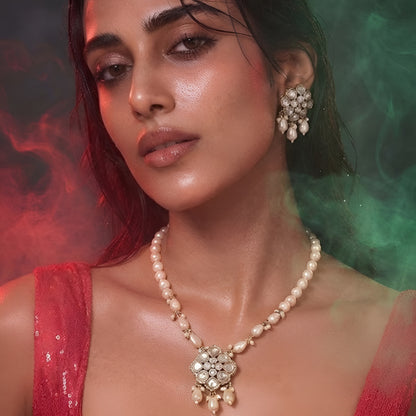 Elegant pearl necklace set with Kundan-style pendant and matching pearl drop earrings

