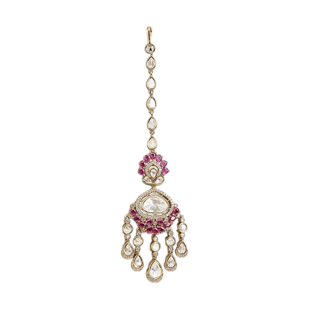 Gold finish kundan polki maang tikka with ruby pink pear-stone fan, large clear centre stone, American diamond halo and chandelier-style kundan drops – Auraa Trends
