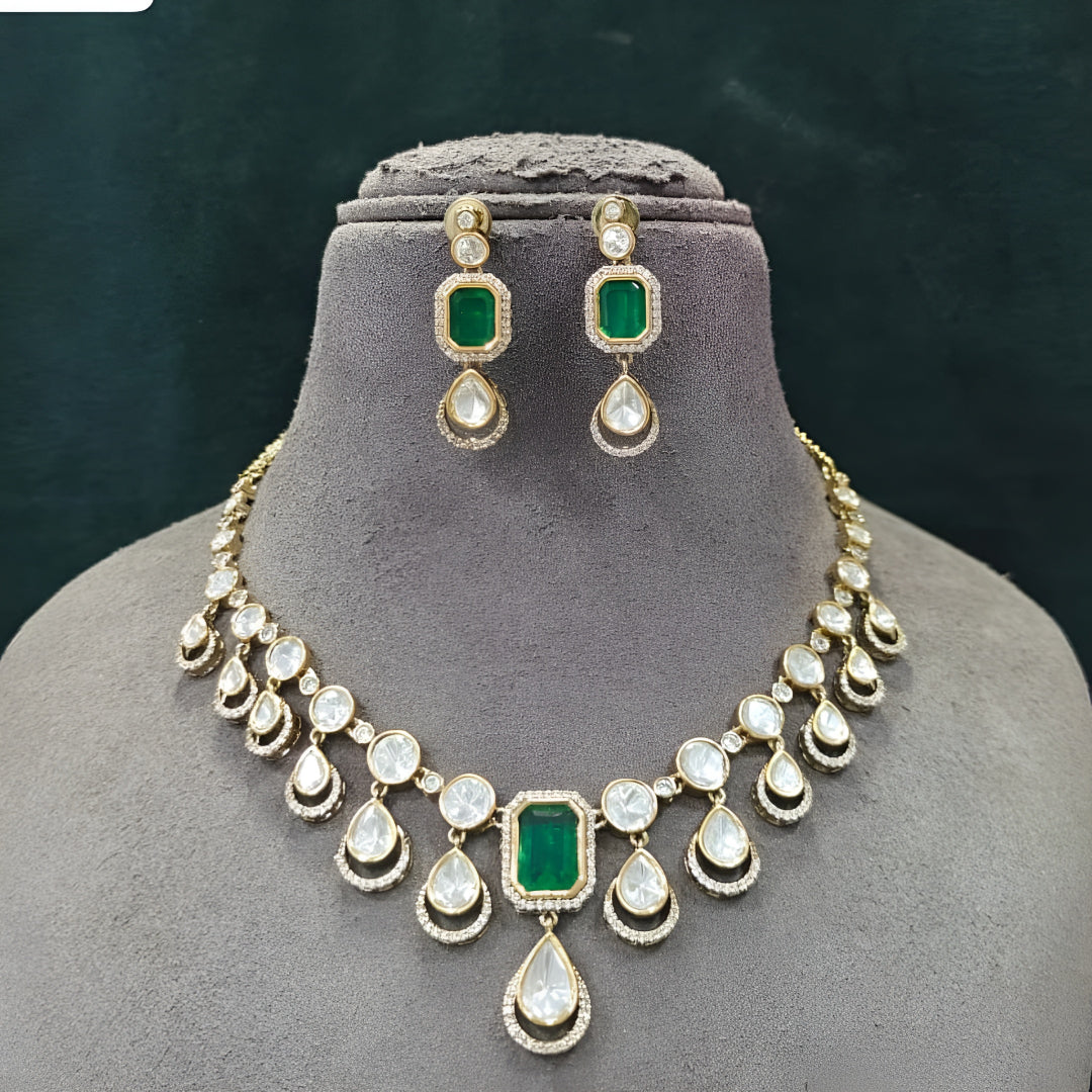 Green kundan necklace set with emerald stone, pear-shaped kundan drops and matching earrings