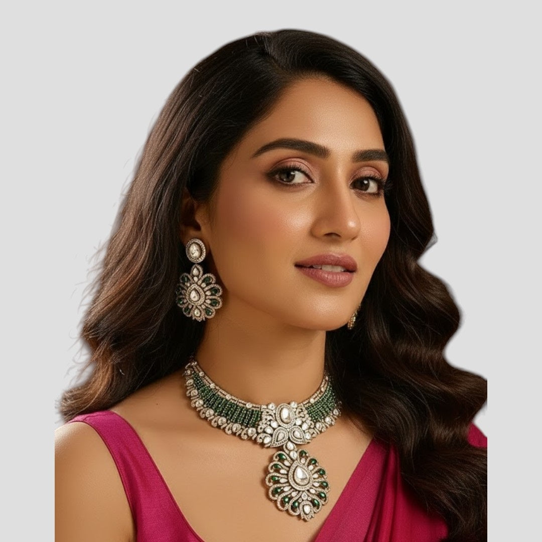 "Green Kundan and Polki bridal necklace set with floral pendant and matching earrings on a gold-toned base."