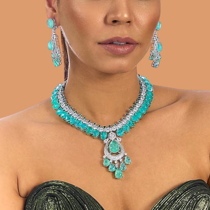 “Silver-toned green stone necklace set with matching earrings for women – elegant bridal and festive jewelry”