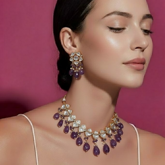 Elegant kundan choker necklace set with amethyst stones and pearl detailing, perfect for weddings and festive occasions.