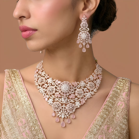 Rose gold pink American diamond bridal necklace set with floral clusters and pink teardrop hangings
