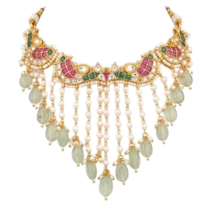 "Gold-plated Kundan Meenakari choker necklace and earring set with pearl and green bead drops, styled bridal jewellery on model"