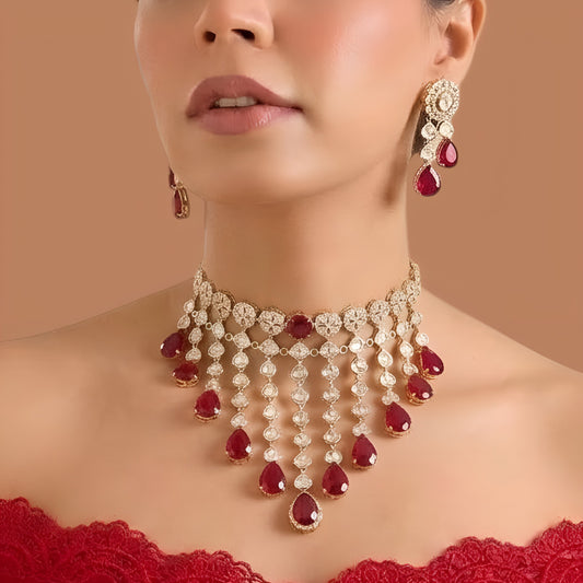 Gold finish ruby red kundan choker necklace set with cascading polki-style strands, ruby pear drops and matching drop earrings – Auraa Trends