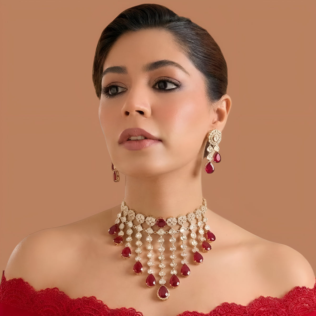 Gold finish ruby red kundan choker necklace set with cascading polki-style strands, ruby pear drops and matching drop earrings – Auraa Trends