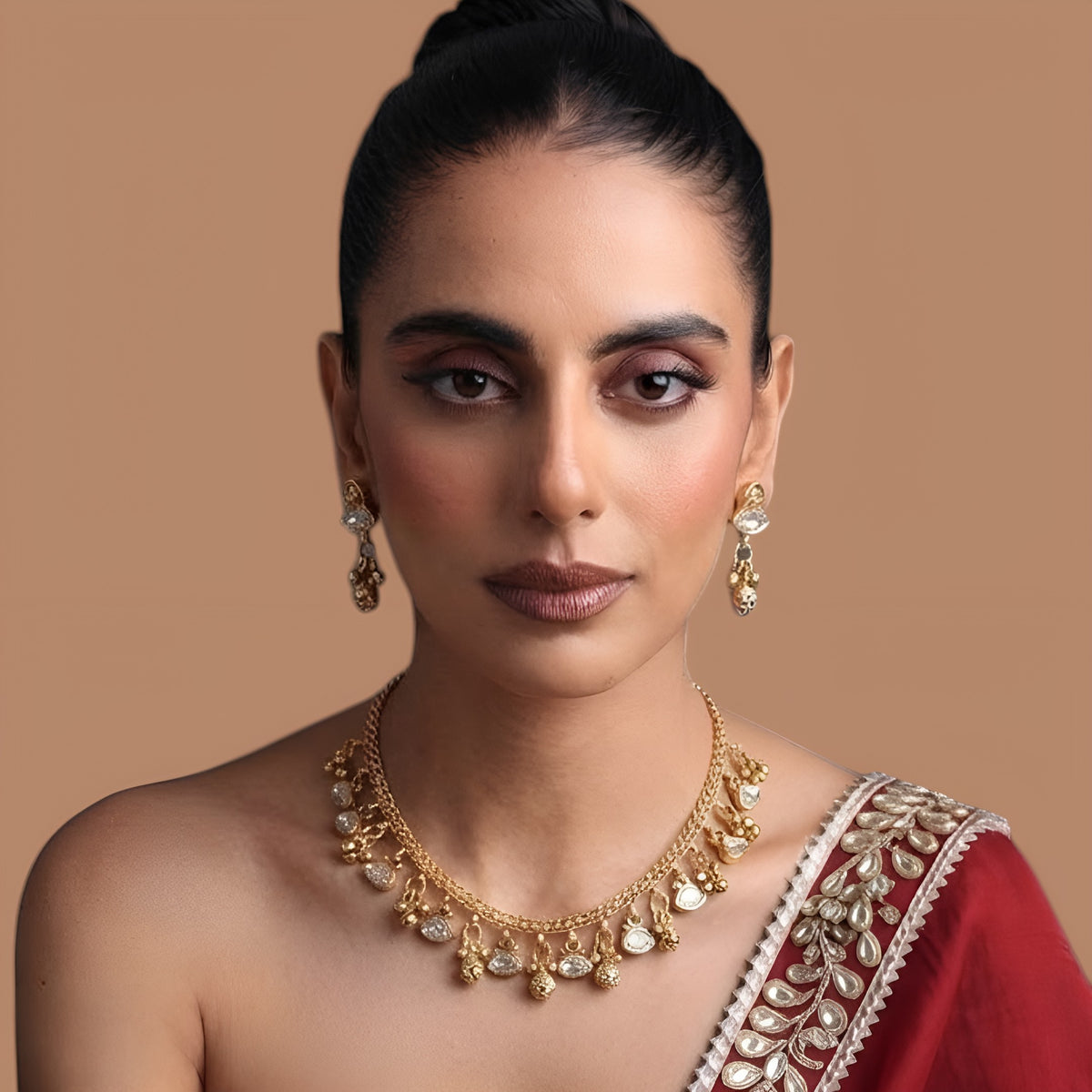 Antique gold finish necklace set with clear marquise polki stone charms and gold bead drops