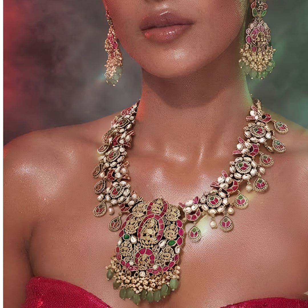 Pink and green temple Kundan necklace set with goddess pendant and matching earrings