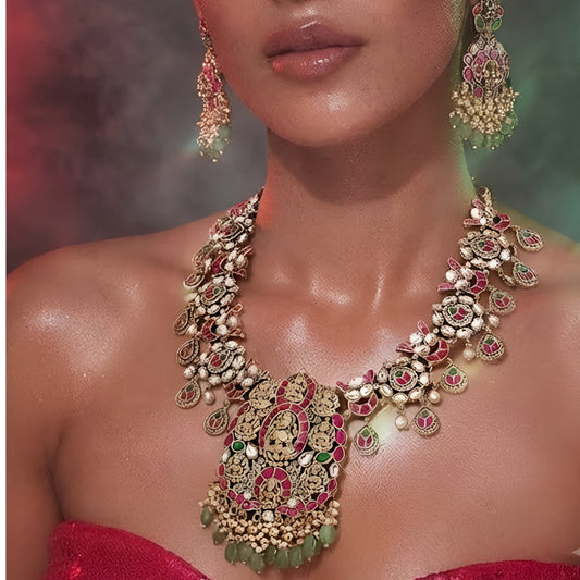Pink and green temple Kundan necklace set with goddess pendant and matching earrings