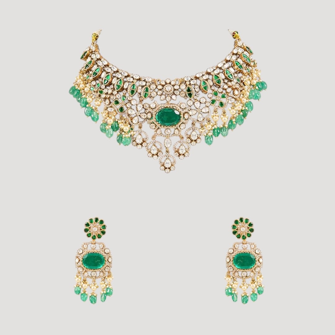 “Gold-plated green stone Kundan choker necklace set with matching earrings”
