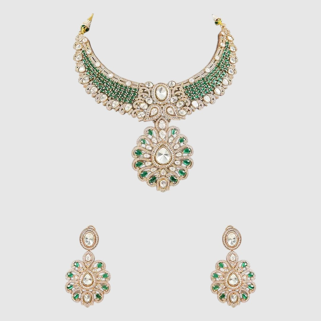 "Green Kundan and Polki bridal necklace set with floral pendant and matching earrings on a gold-toned base."