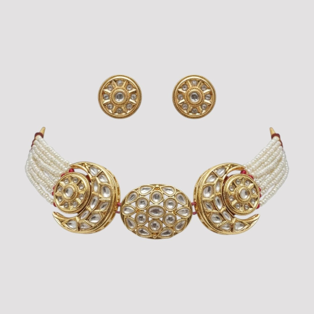 “Gold-plated Kundan choker necklace with pearl strands and matching floral Kundan stud earrings.”
