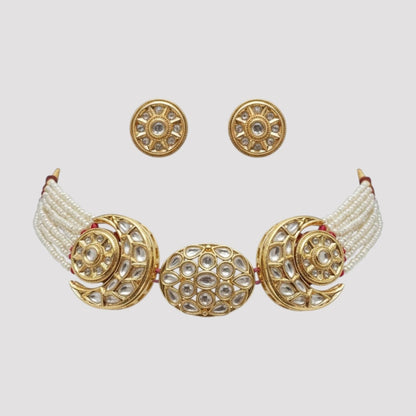 “Gold-plated Kundan choker necklace with pearl strands and matching floral Kundan stud earrings.”