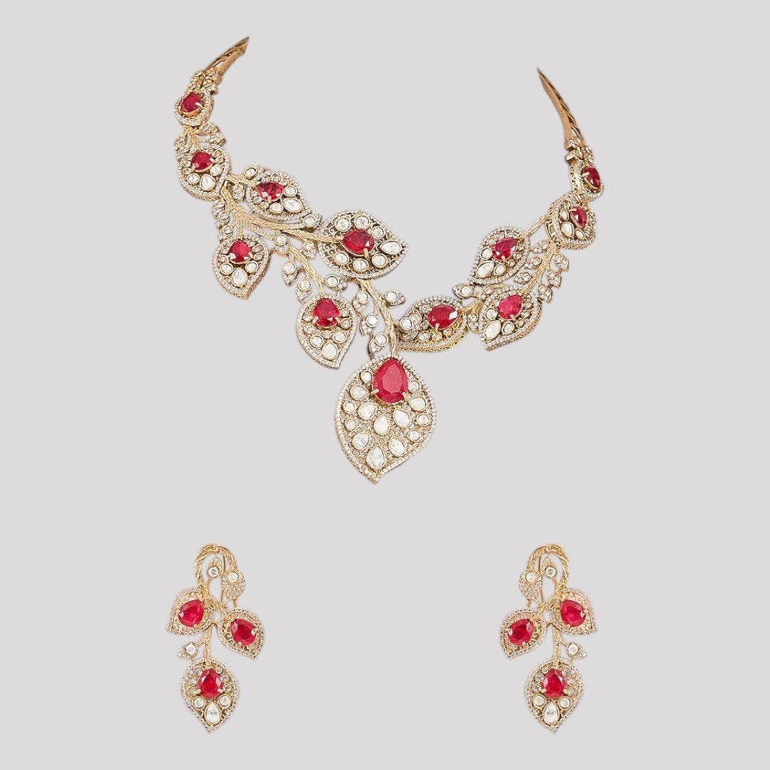 Elegant red and white stone necklace set with matching earrings, featuring a leaf-inspired design.