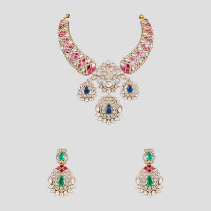 "Gold-plated kundan necklace set with pink inlay, blue teardrop stones, green emerald drops, and matching earrings"