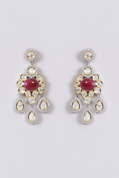 Ruby red cabochon polki chandelier earrings with pear-shaped drops and zircon halo in two-tone gold and silver finish