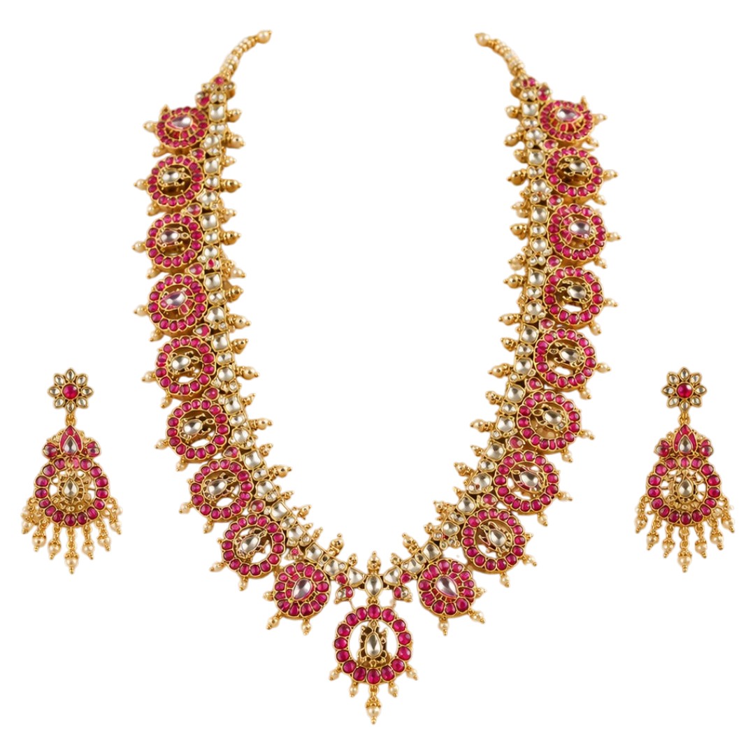 Gold-plated Kundan necklace set with pink ruby-look stones and matching statement earrings for bridal, wedding, festive, and traditional wear.
