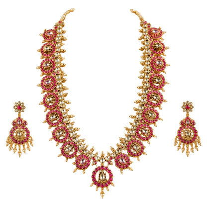 Gold-plated Kundan necklace set with pink ruby-look stones and matching statement earrings for bridal, wedding, festive, and traditional wear.