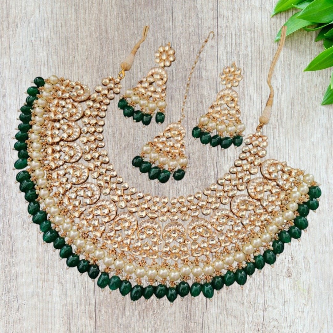 Bridal Kundan Choker Necklace Set with Green Beads & Pearls - Auraa Trends - Necklace Set -  - Auraa Trends - "Traditional bridal kundan choker necklace set with green beads, pearls, and matching earrings and maang tikka