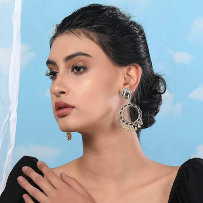 White enamel gold hoop earrings with ghungroo bead drops