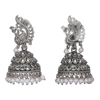 Buy Aviana Silver - Plated Crystal Studded Traditional Jhumka Earrings for Women - Auraa Trends - Jhumka -  - Auraa Trends - Lady wearing silver - plated crystal peacock pattern jhumka earrings with pearl drops, Indian ethnic traditional jewellery