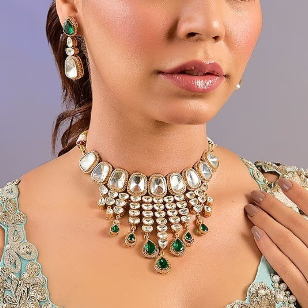 Kundan polki bridal necklace set with emerald green drops and matching earrings