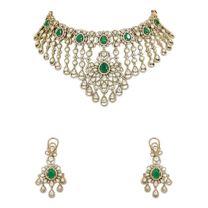 "Antique gold Kundan waterfall choker necklace with cascading fringe and emerald accents, matching chandelier drop earrings"
