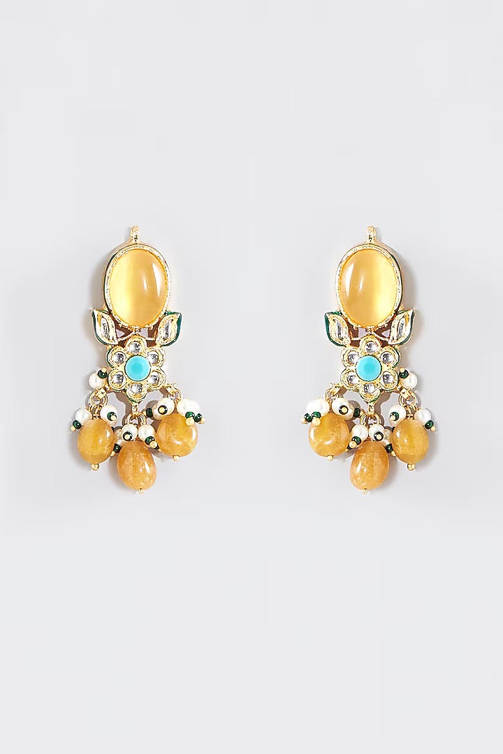 Multi-strand white beaded kundan choker necklace with yellow stone centrepiece and yellow bead drops, shown with matching earrings