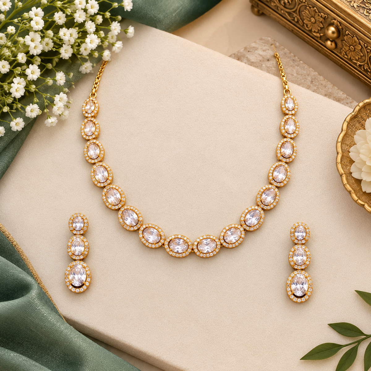 Rose gold American diamond oval link necklace set with matching three-tier drop earrings by Auraa Trends