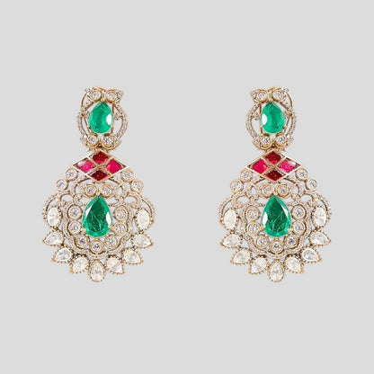"Traditional Kundan bridal jewelry set with a gold-toned necklace featuring ruby and emerald stones, paired with matching earrings."