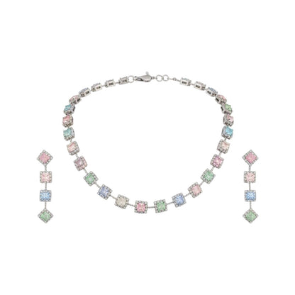 "Elegant pastel pink and green stone necklace with matching earrings displayed on black velvet stand"
