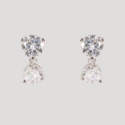 Silver-toned diamond-cut necklace with matching double-stone drop earrings on a light background