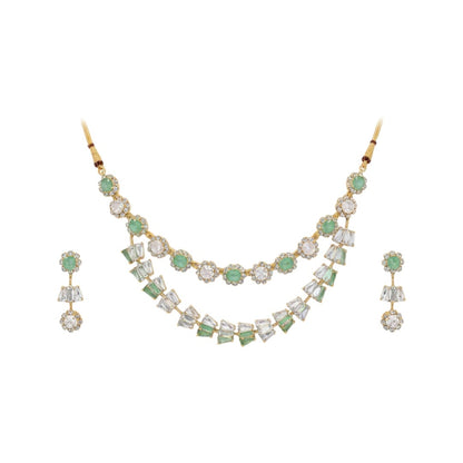Gold-plated green and white American diamond necklace set with matching earrings on red display stand"